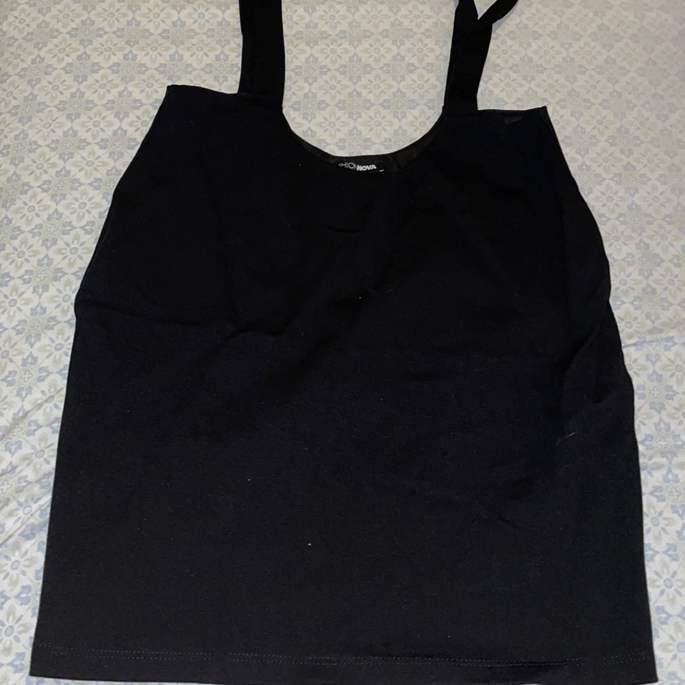 BLACK OVERALL MINI SKIRT SIZE MEDIUM